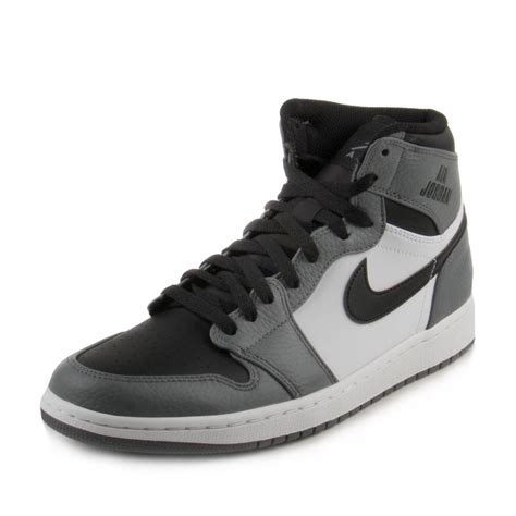 grey high top Nike shoes